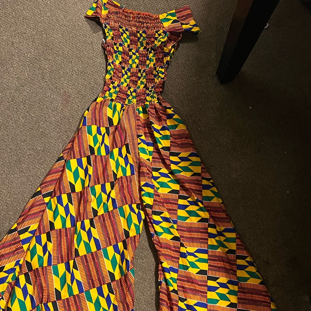Original ethic cloth material from Ghana and hand made this summer .